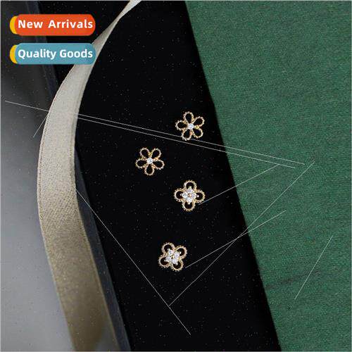Ins four petals daisy earrings female Korea small hollow flo