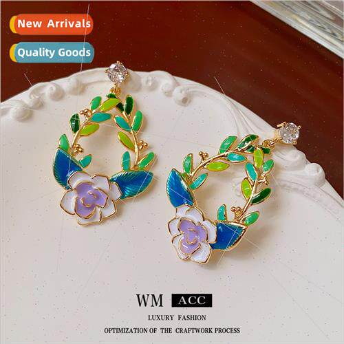 lver needle oil drop hollow flowers leaves earrings French e