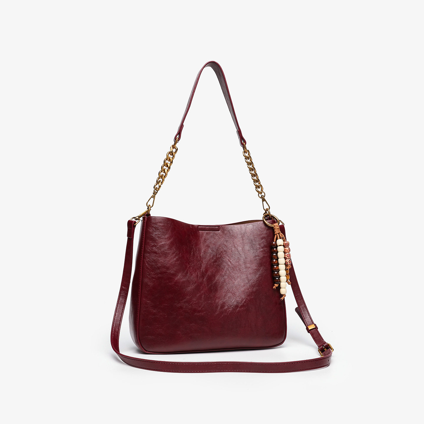 意尔森复古潮流时尚大容量水桶包女高级感真皮百搭通勤单肩斜挎包