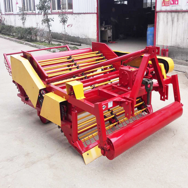 可选择多种宽幅平铺式摆放四轮车拖拉机带动花生农作物花生收获机