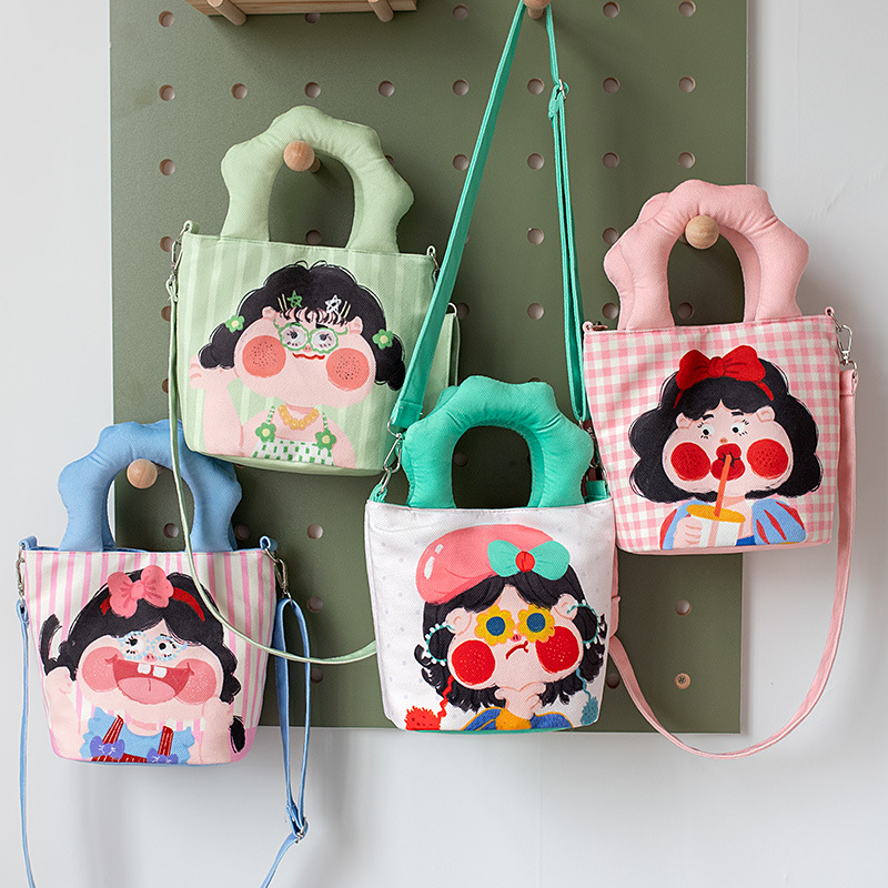 卡通搞怪条纹格子充棉女式手提包