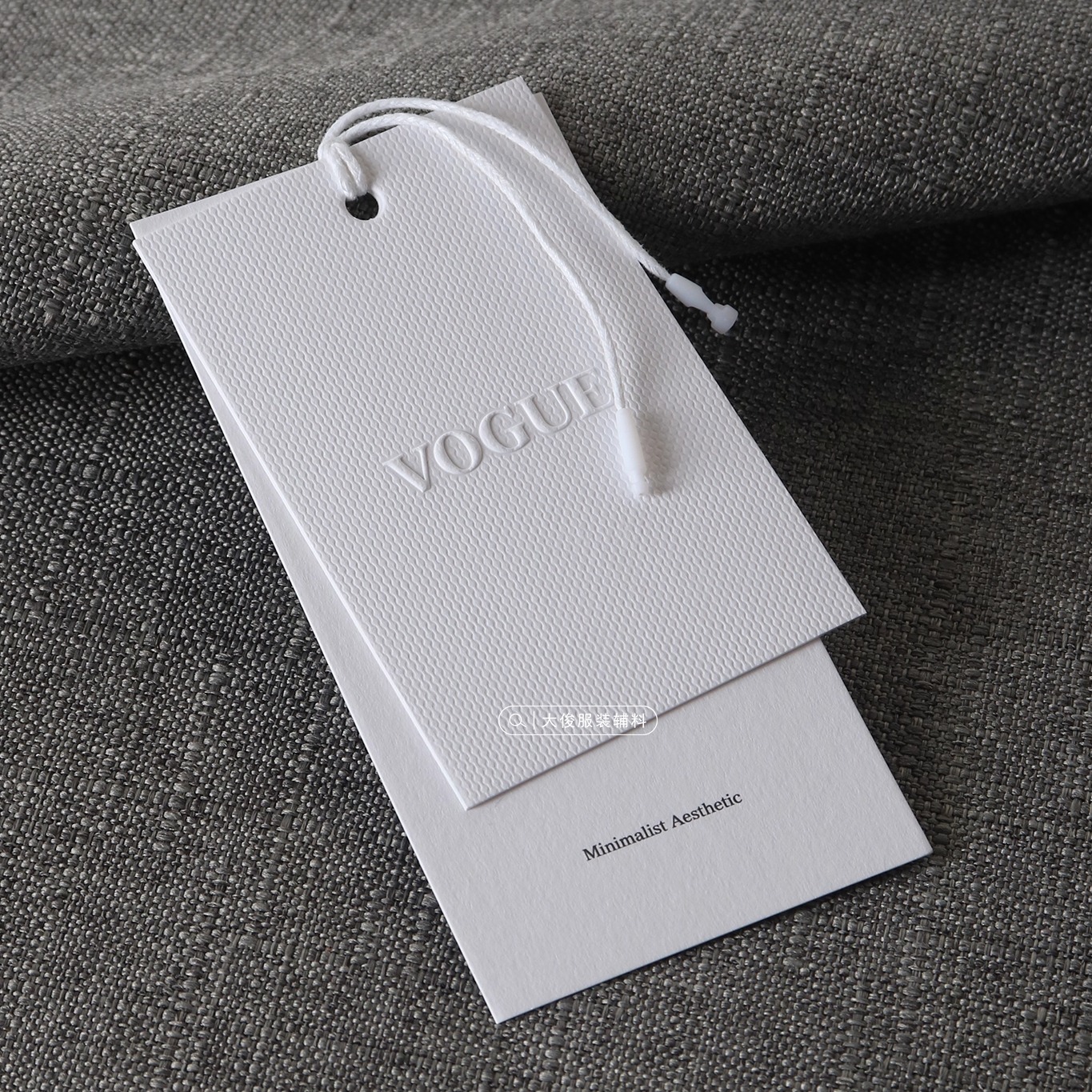 高端衣服吊牌凹凸工艺大牌风格
