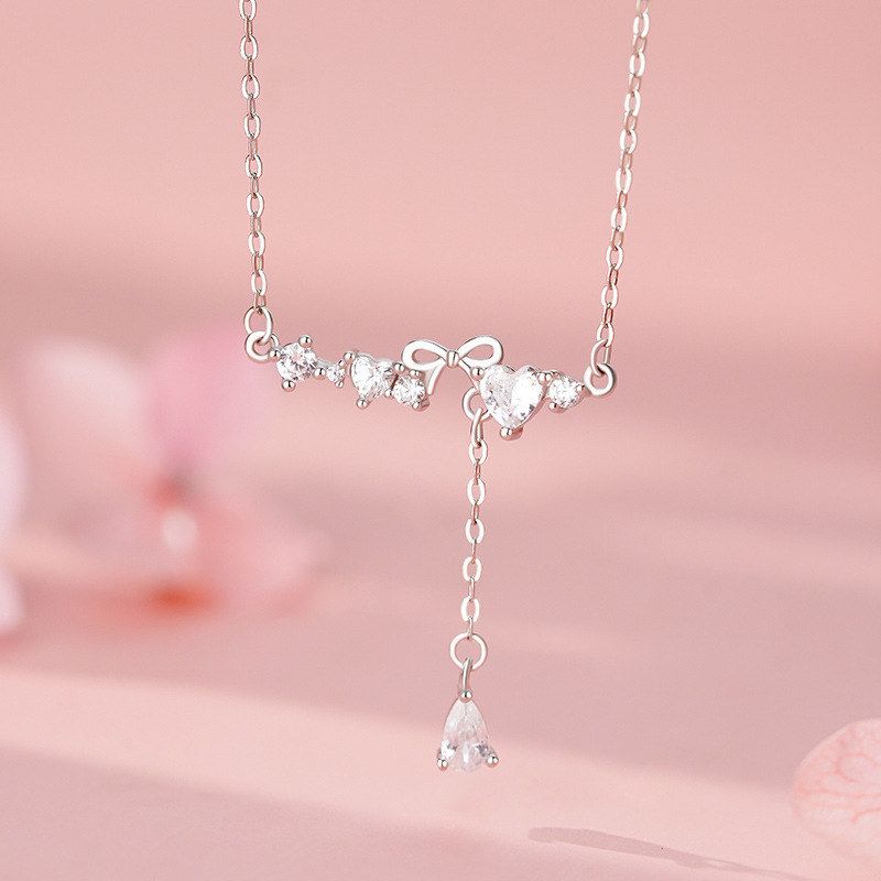 足银S999蝴蝶结爱心流苏项链韩风韩版精致可爱韩风锁骨链