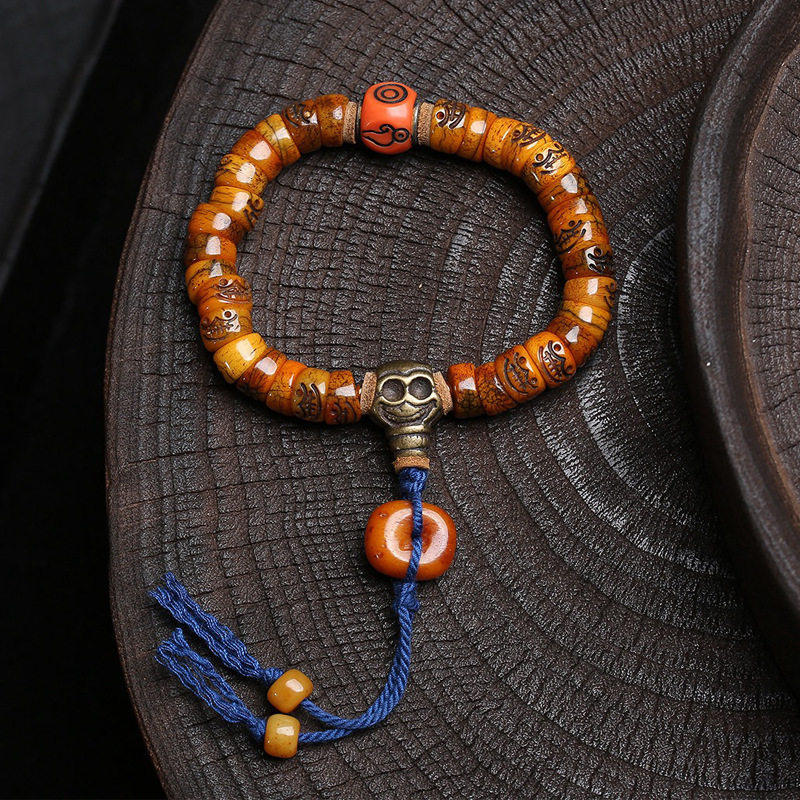 藏传回流骨大肠珠雕刻阿呆手串单圈料器牦牛骨铜配饰文玩佛珠手钏