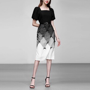 夏季女装2026新款气质黑白撞色泡泡袖修身收腰显瘦连衣裙长裙裙子