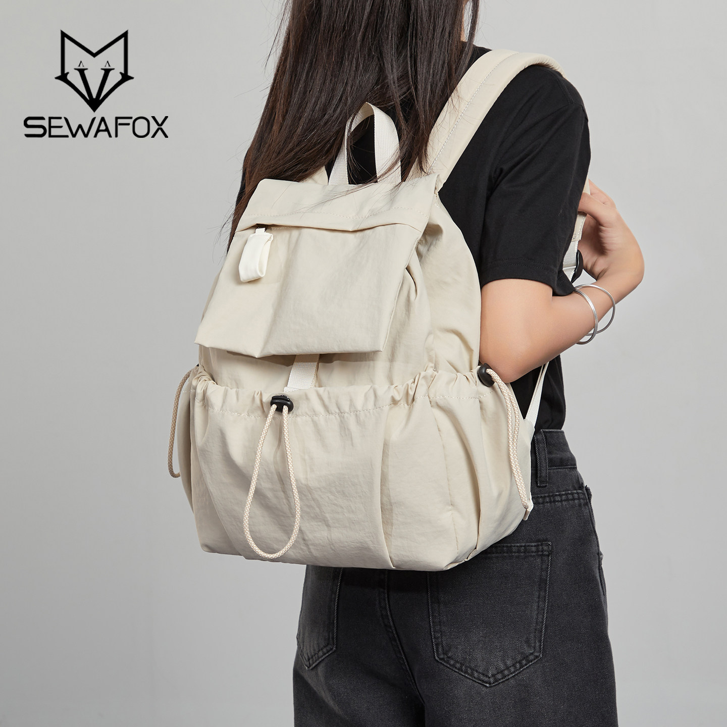 轻便旅游防水背包女2025新款大容量双肩包简约通勤大学生书包男