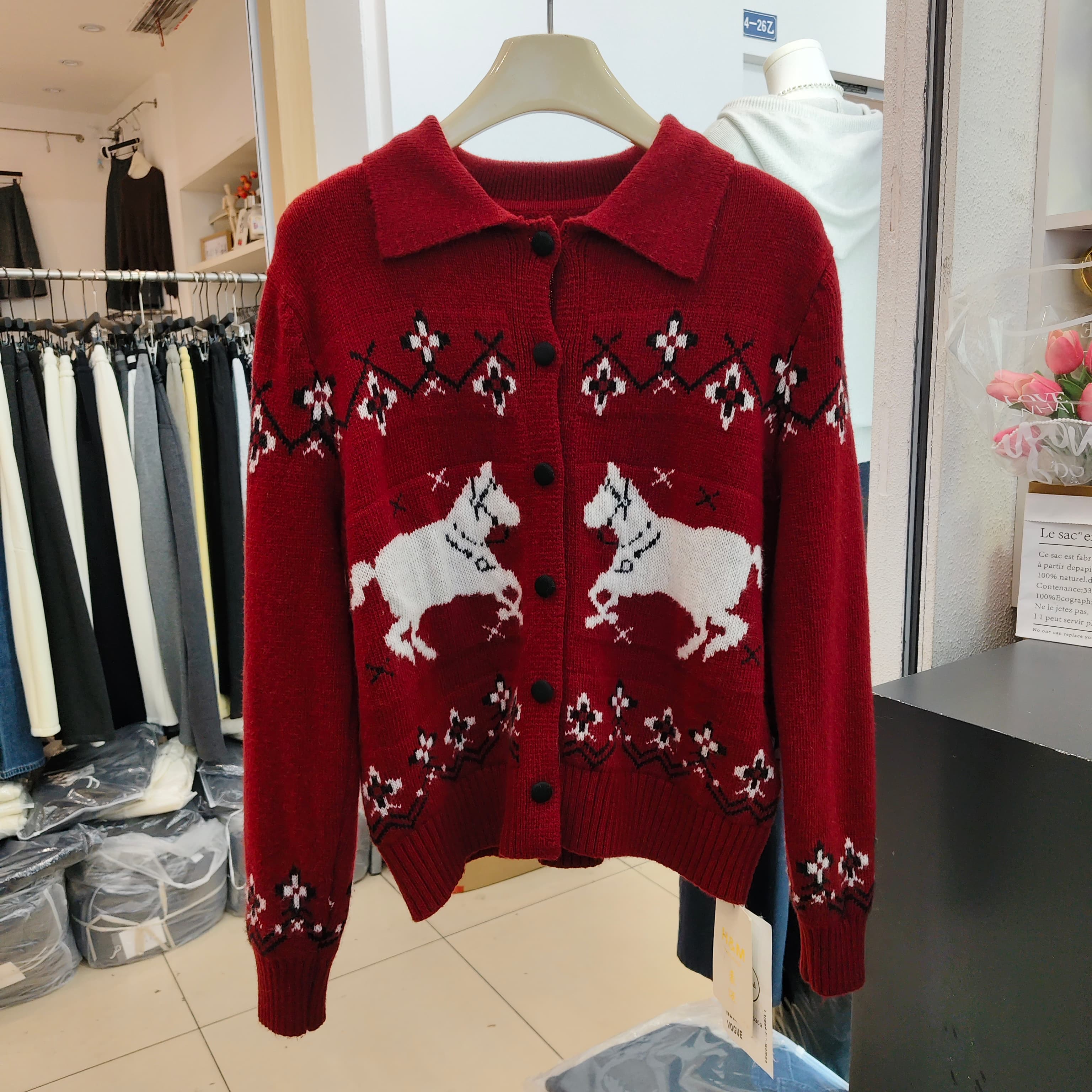 提花翻领浣熊绒针织开衫女