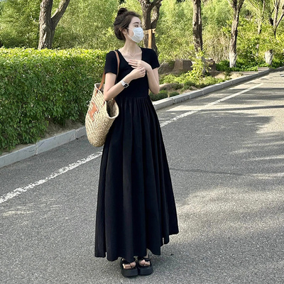法式气质黑色赫本风连衣裙子女夏季2024新款海边度假收腰显瘦长裙