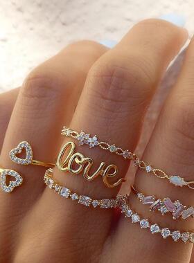 欧美跨境新款金色组合关节戒指创意时尚爱心Love点钻7件戒指套装