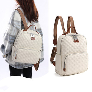 高级感真皮女士双肩包2025新款女小众通勤电脑背包大学生白色书包