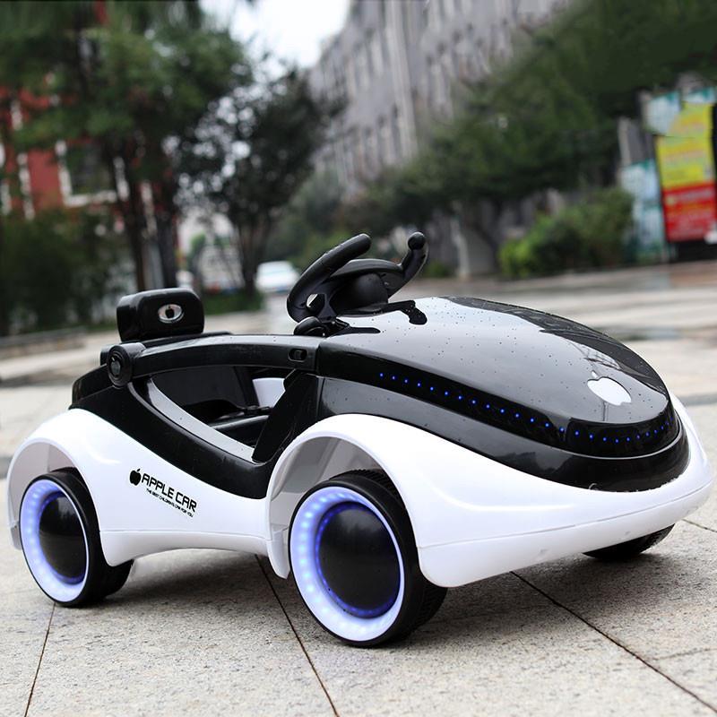 科幻儿童电动汽车四轮闪光带遥控可坐人男女宝宝摇摆充电玩具童车