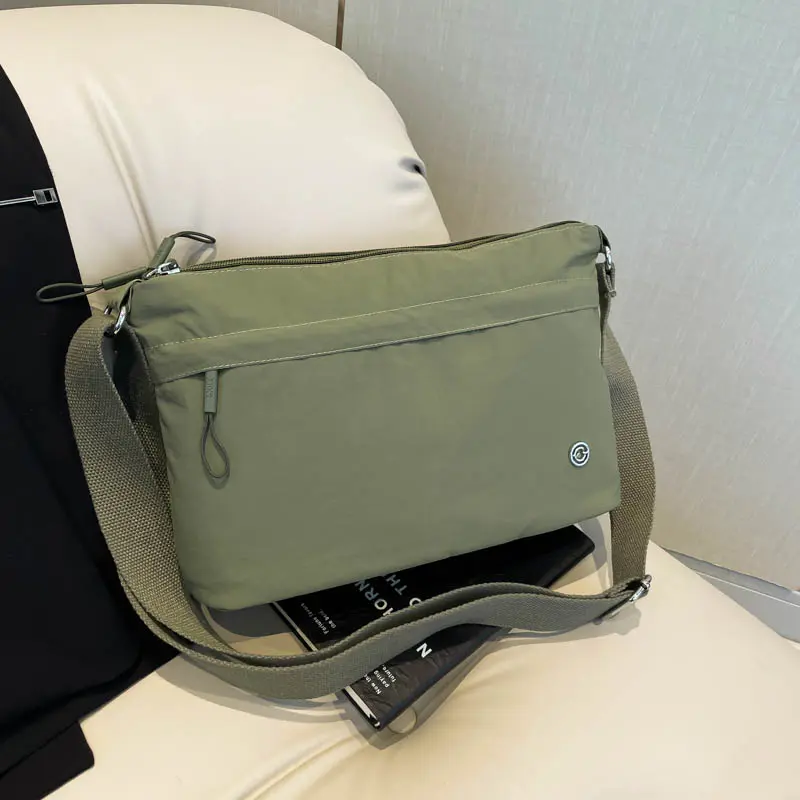 999款多层包包大容量男女同款轻便休闲百搭单肩包斜挎包