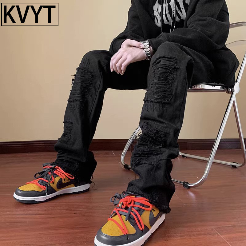 秋季穿搭高级感牛仔裤男款潮牌2025春季新款美式破洞黑色微喇裤潮