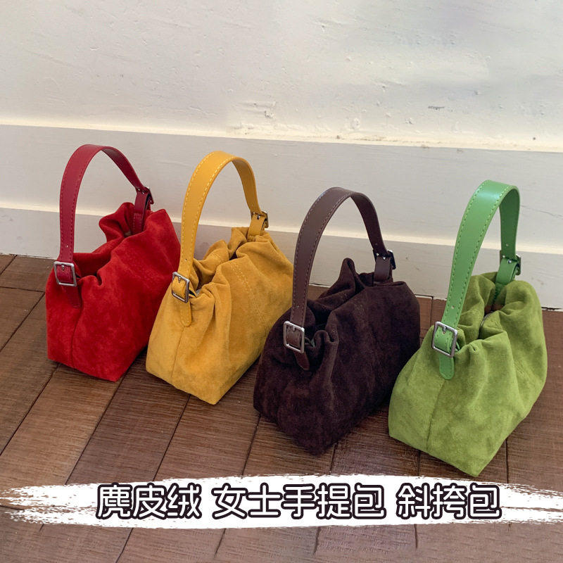 麂皮红色包包新款小众设计麂皮绒女包抽绳秋冬百搭简约手提包时尚