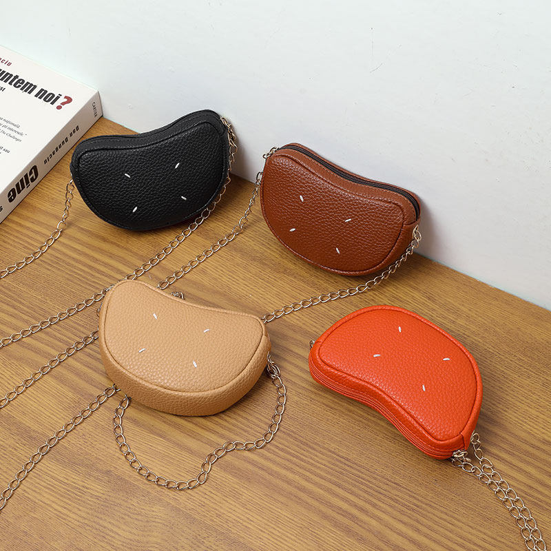 豌豆零钱包女2026新款迷你真皮挂饰口红耳机收纳斜挎小废包元宝包