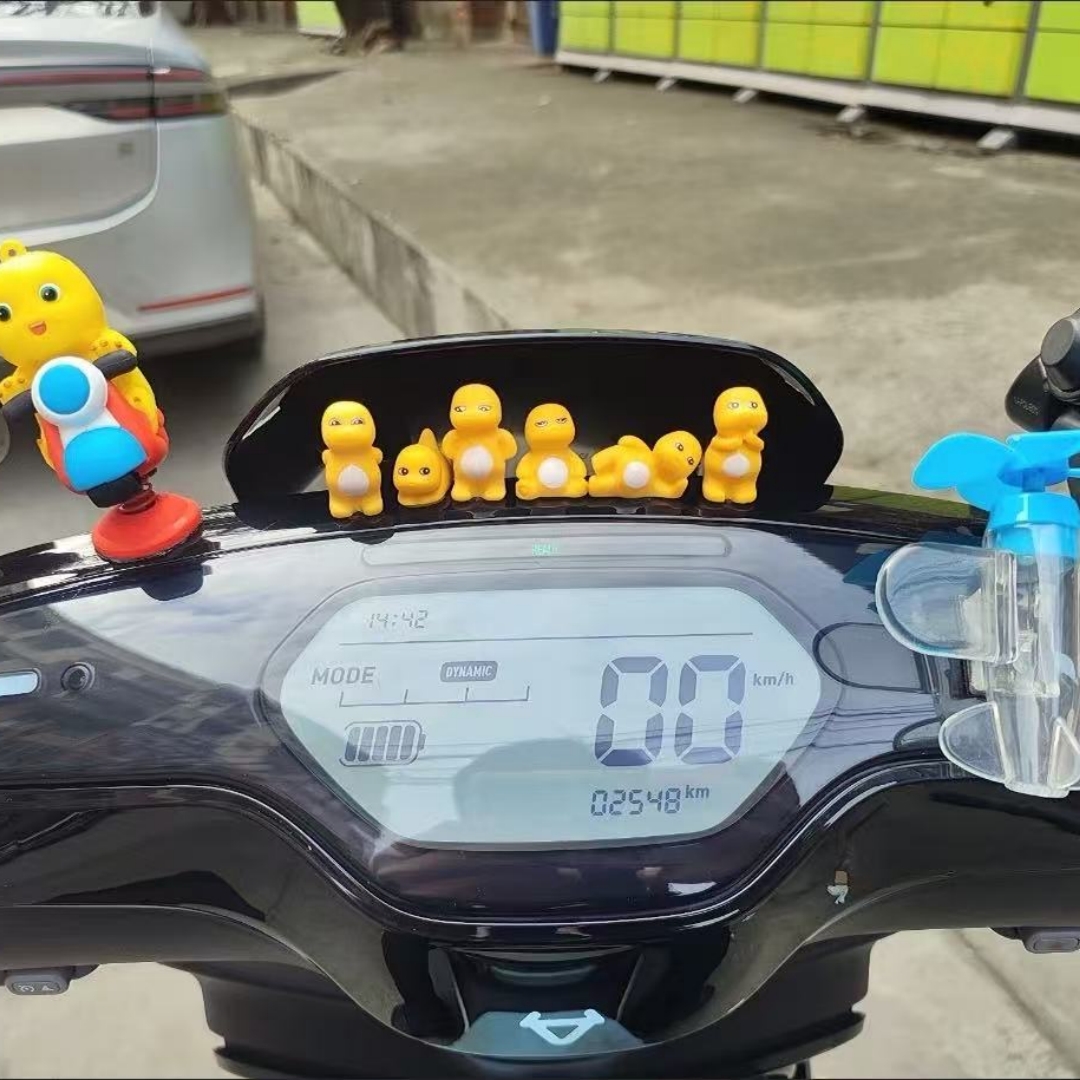 可爱治愈系奶龙车载摆件电动车装饰小配件雅迪九号电瓶车小摆件女