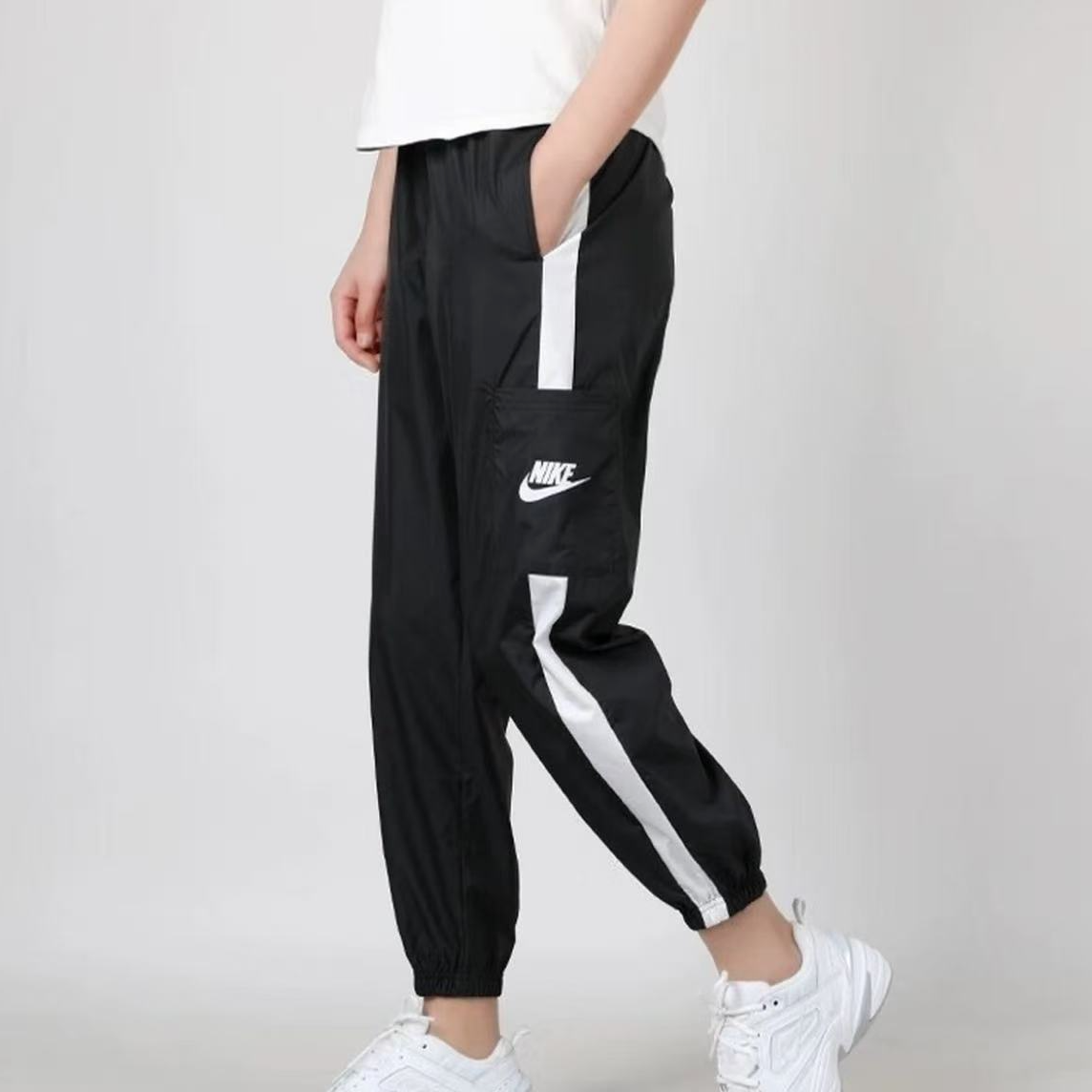 NIKE/耐克 Sportswear 轻盈梭织 休闲拼接收口运动长裤CJ7347-010