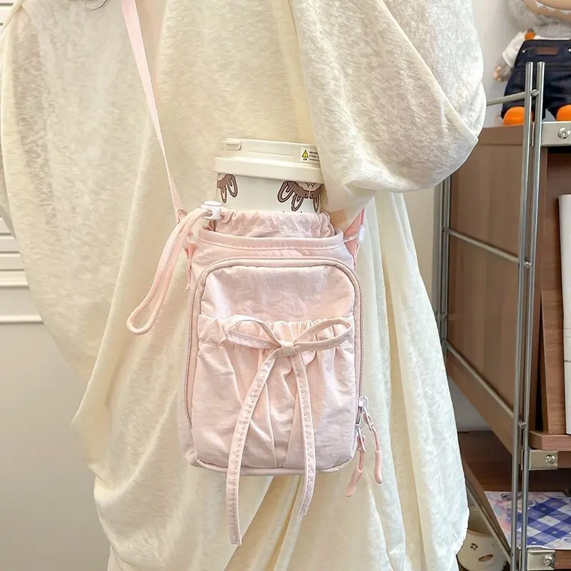 夏季日系蝴蝶结斜挎手机包女款