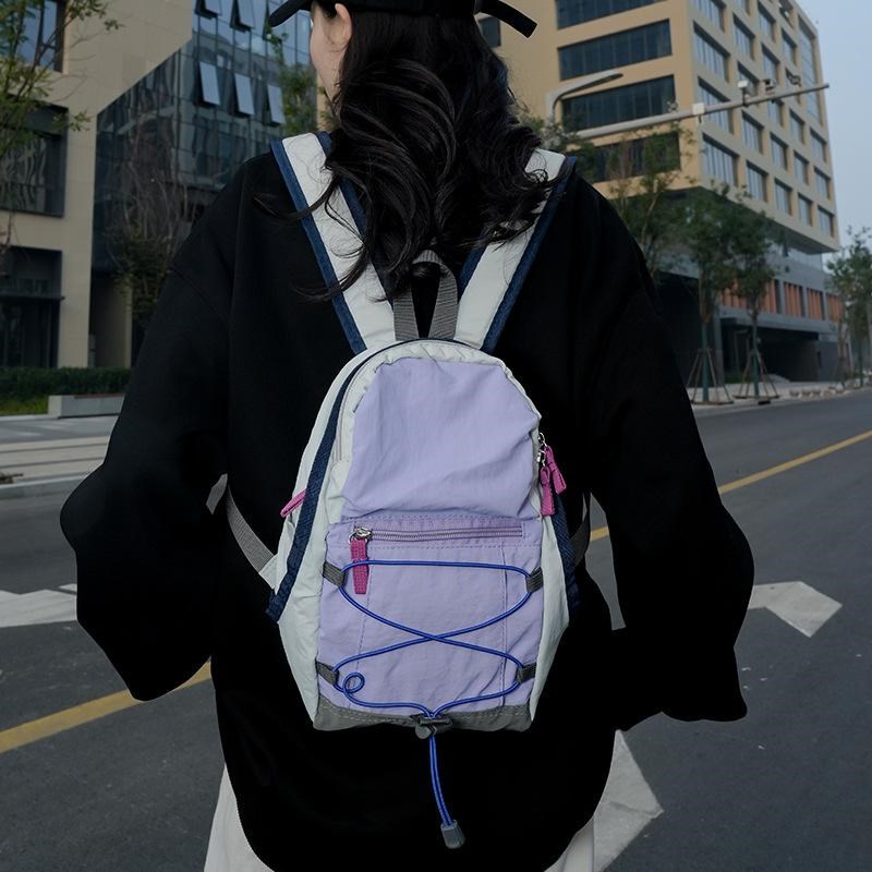 户外撞色双肩包轻便旅行包登山小揹包高颜值初高中学生上课书包潮