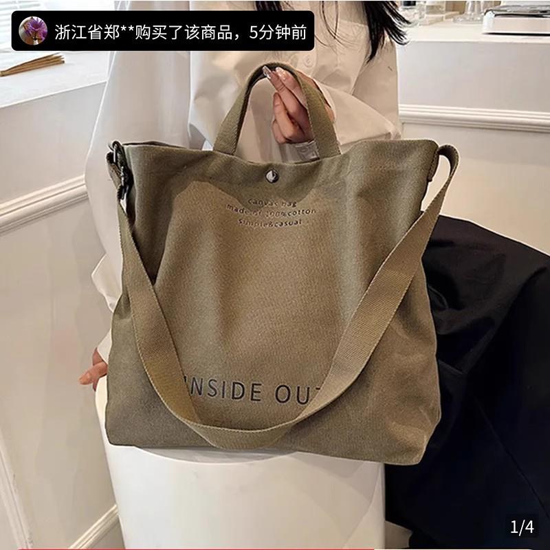 芸菲服饰工厂轻奢帆布斜挎包手提包通勤包男女士单肩包大容量背包