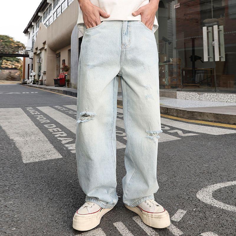巴黎风潮破洞浅色牛仔裤