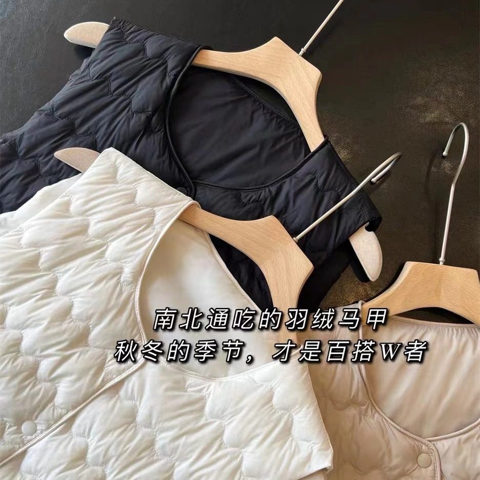 明摩羽绒服波浪女士马甲轻薄短款马夹坎肩白鸭绒内搭外穿2025新款