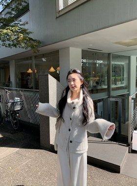 isaro uu 私服系列羊绒浣熊绒堆堆领~翻领侧门襟单排扣喇叭袖毛衣