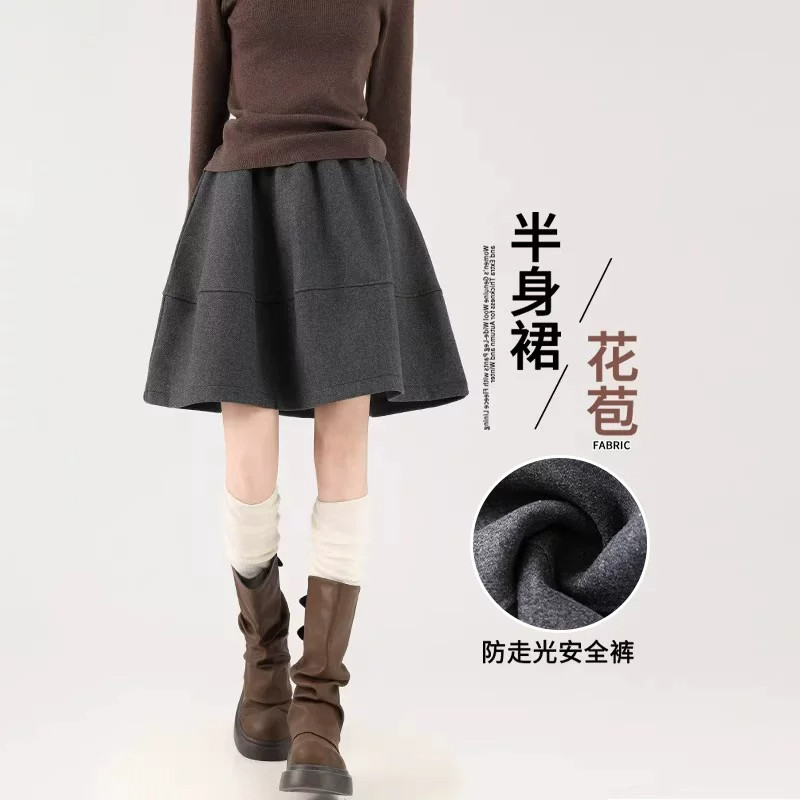 毛呢黑色半身裙短裙女秋冬季2026新款a字伞裙辣妹风五分花苞半裙