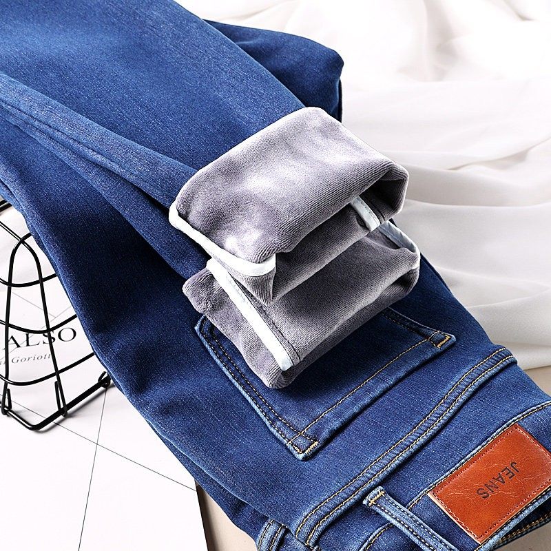 蓝色牛仔裤女秋冬加绒加厚修身显瘦一体绒2025新款外穿高腰小脚裤