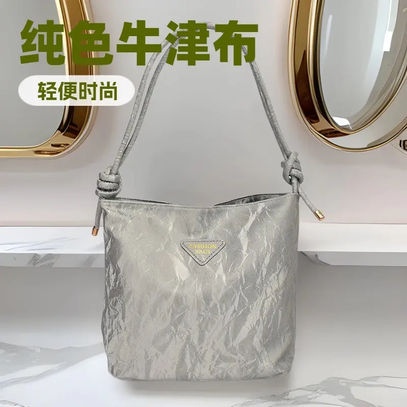 高级感包包女2024夏季新款时尚单肩斜挎包大容量小方包手提可调节