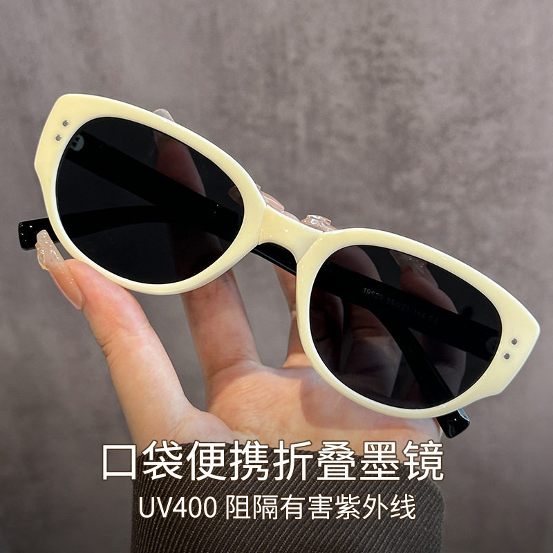 新款白色复古墨镜猫眼女款折叠米钉太阳镜偏光防紫外线眼镜可折叠