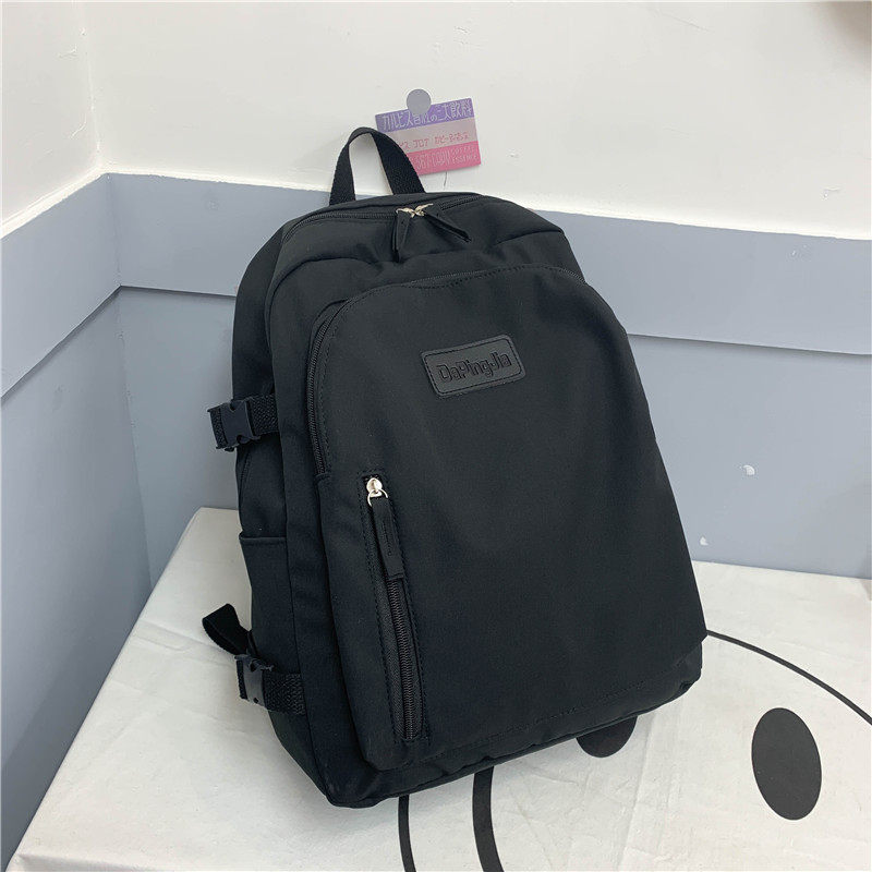 大容量纯色书包大学生背包女双肩夏简约日系百搭高中生小众电新款