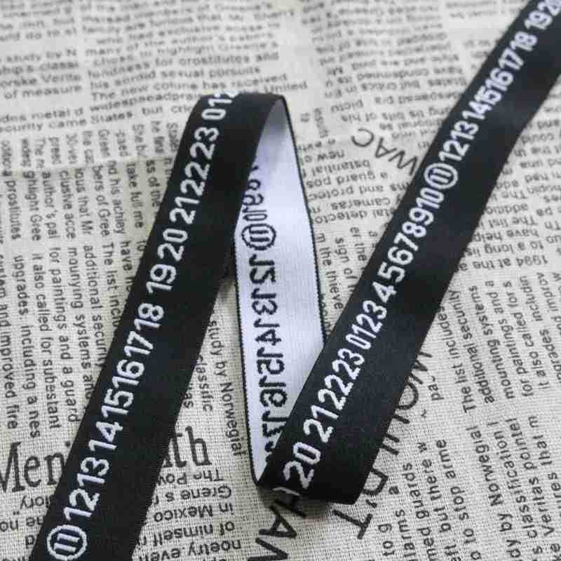 厂家直供2.5cm尼龙头电脑提花松紧爆款弹力腰数字橡筋服装辅料