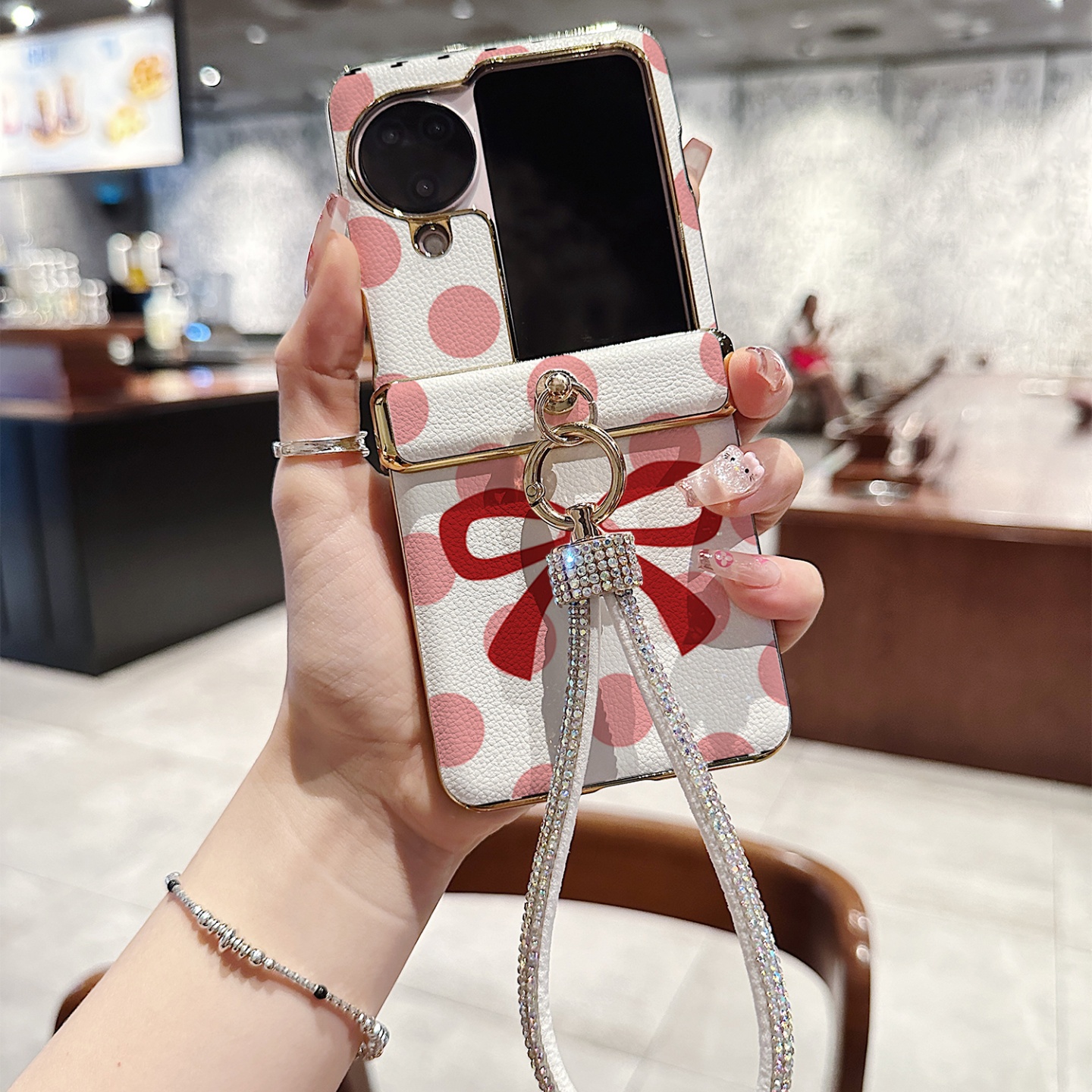 粉波点蝴蝶结皮纹折叠屏手机壳