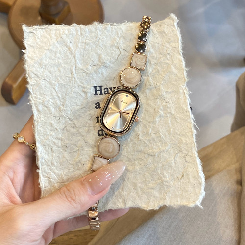 ICHUMU奶茶色不规则手链表