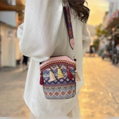 韩国小众设计感民族风流苏水桶包时尚 宽肩带单肩斜挎包