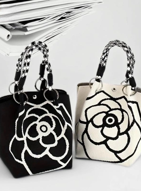 韩国小众设计感山茶花水桶包女2025新款时尚百搭单肩斜挎手提包