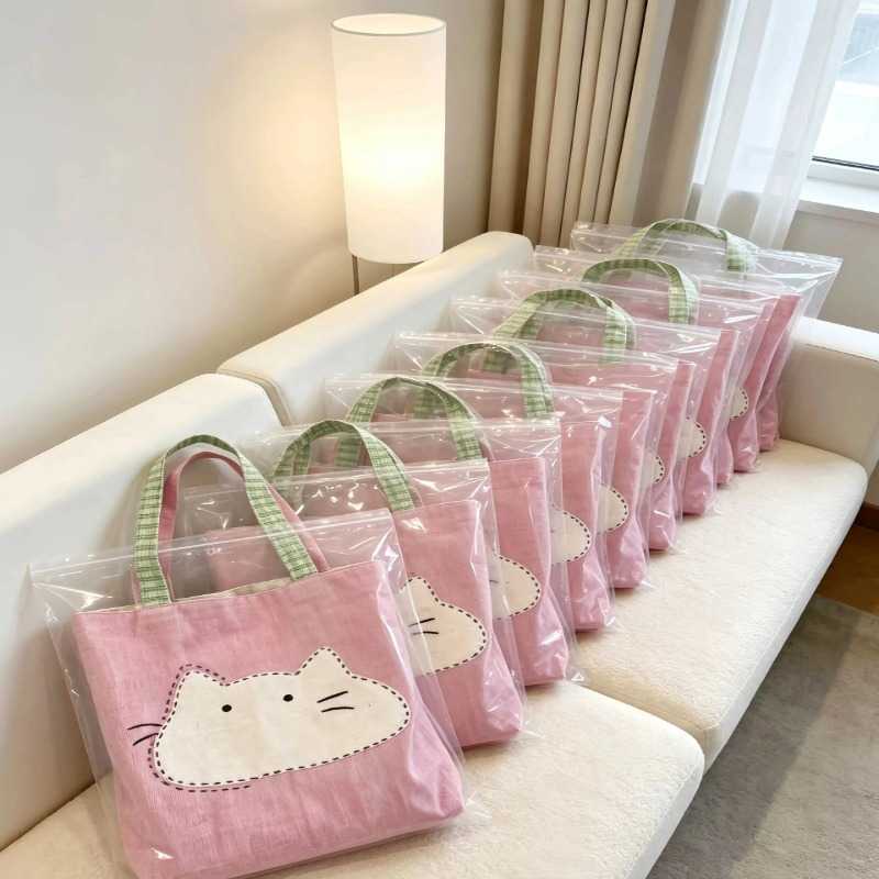 日系小猫帆布包女大容量通勤上课