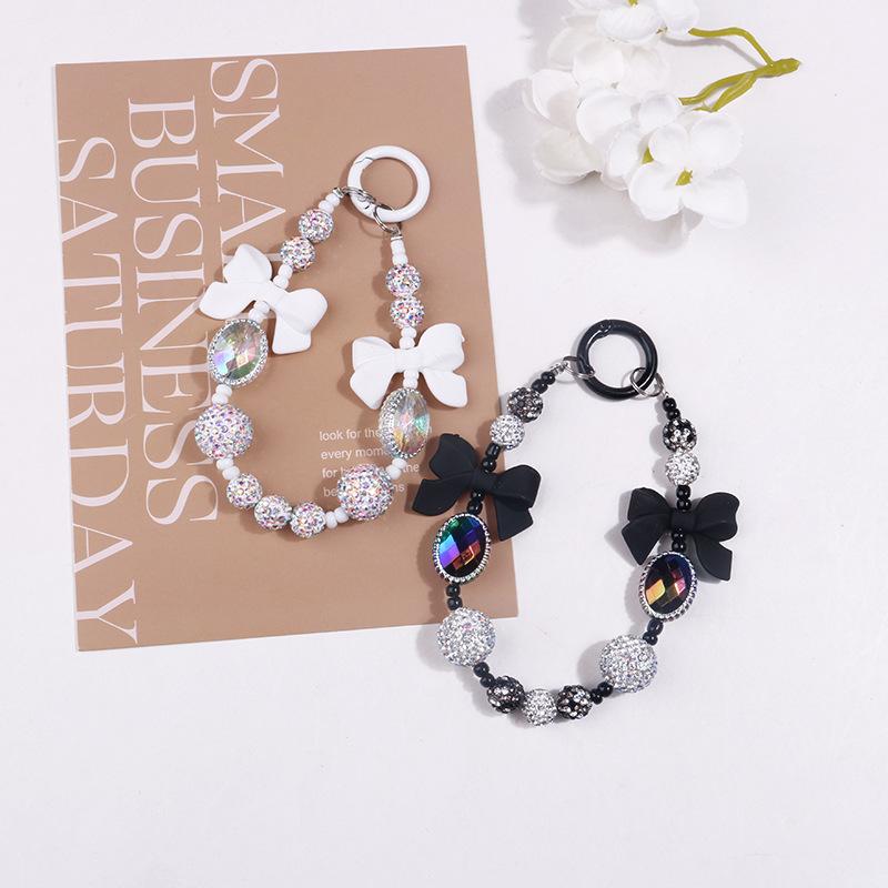 新款创意韩版树脂蝴蝶结水钻串珠钥匙扣挂件配链包相机车钥匙挂链