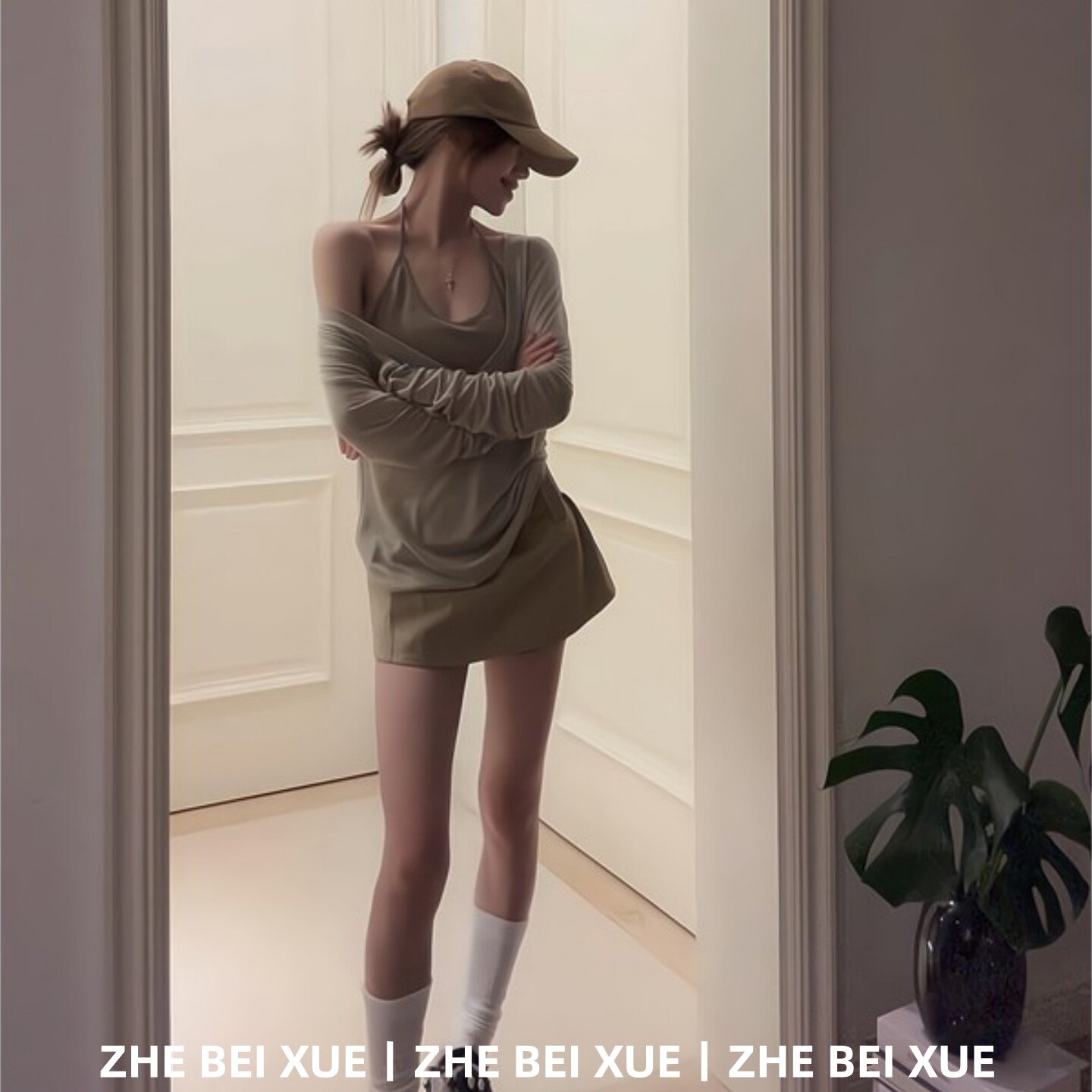 早春套装韩系挂脖吊带背心宽松上衣显瘦半身裙淡人高知穿搭一整套