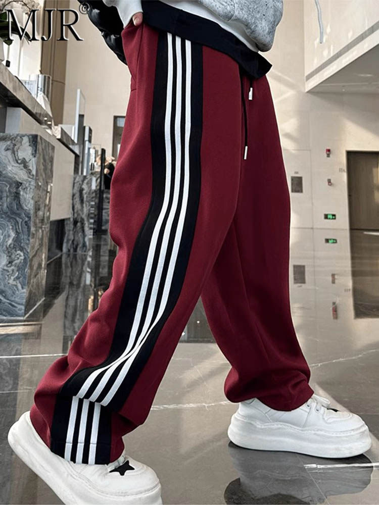 时尚运动裤男款春秋冬季2025年新款潮牌拼接男裤子百搭宽松休闲裤