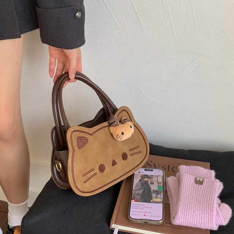 卡通可爱小众设计猫咪手拎包包女2025秋冬新款洋气百搭单肩斜挎包