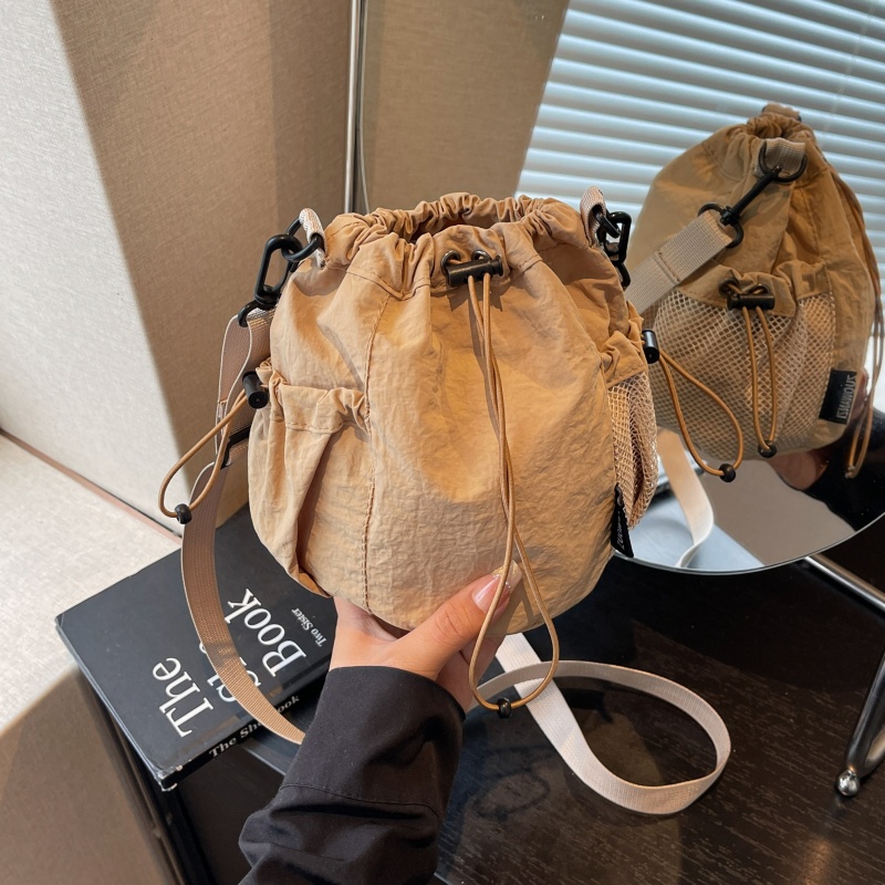 简约轻便帆布包女运动旅行水桶包