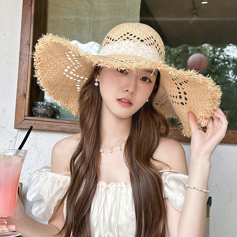 朵澜镂空拉菲草帽女2026夏季大帽檐海边度假遮阳帽显脸小防晒帽子