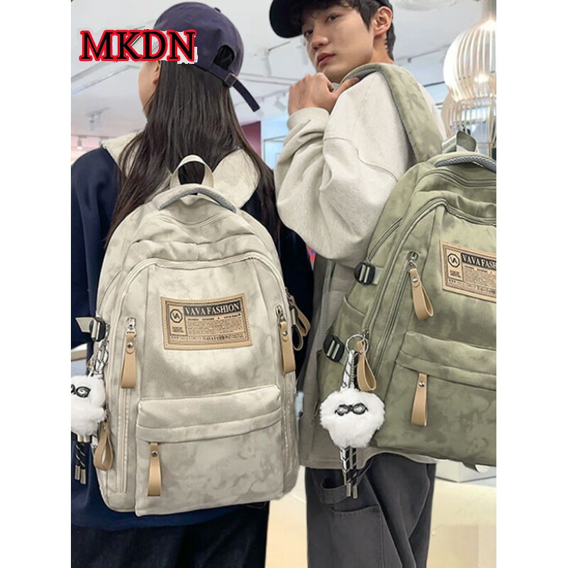 法国正品MK DN~书包女2025新款初中生大容量双肩包男减负护脊背包