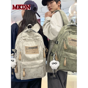 法国正品MK DN~书包女2025新款初中生大容量双肩包男减负护脊背包