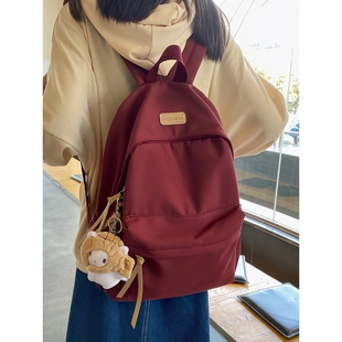 法国初中生书包女红色简约小众背包日系轻便女生高中大学生双肩包