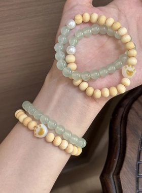 夏天奶香木拼接双圈手串小众设计可爱卡通高级感炭烧猫爪闺蜜手链