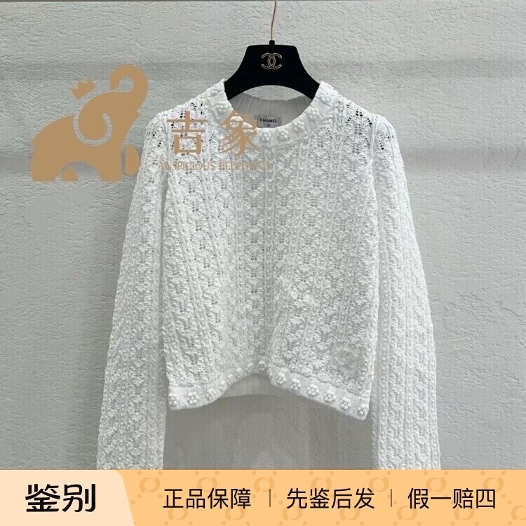 Chanel山茶花镂空钩花针织衫