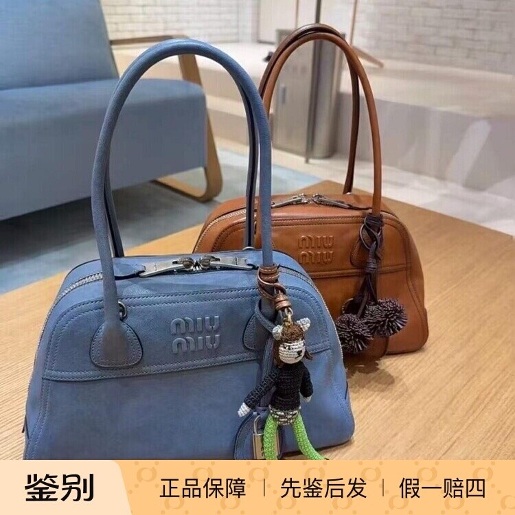 缪缪2026皮革保龄球手提公文包
